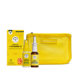 Beekeeper's Natural wellness gift set featuring a yellow mesh pouch, a box of Propolis + Vitamin C, an Immune Support spray, and a Nasal Spray Mask, all on a translucent background.