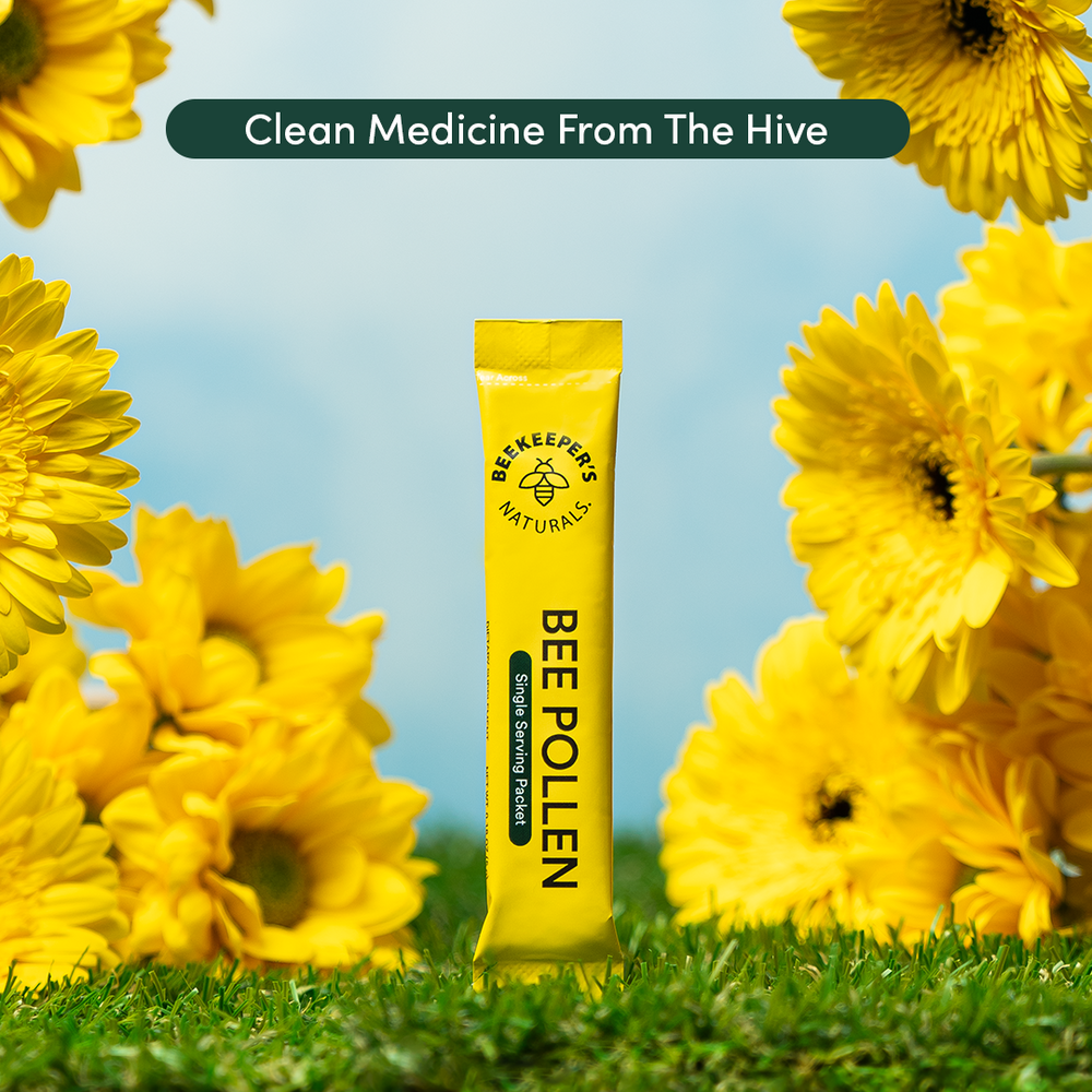 Bee Pollen single-serving packet by Beekeeper's Naturals. "Clean Medicine From The Hive" with blooming yellow flowers.