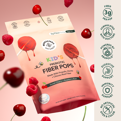 Package of Kids Prebiotic Fiber Pops with cherries and raspberries on a pink background