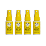 Four bottles of Beekeeper's Naturals Propolis Immune Support daily throat spray on a white background
