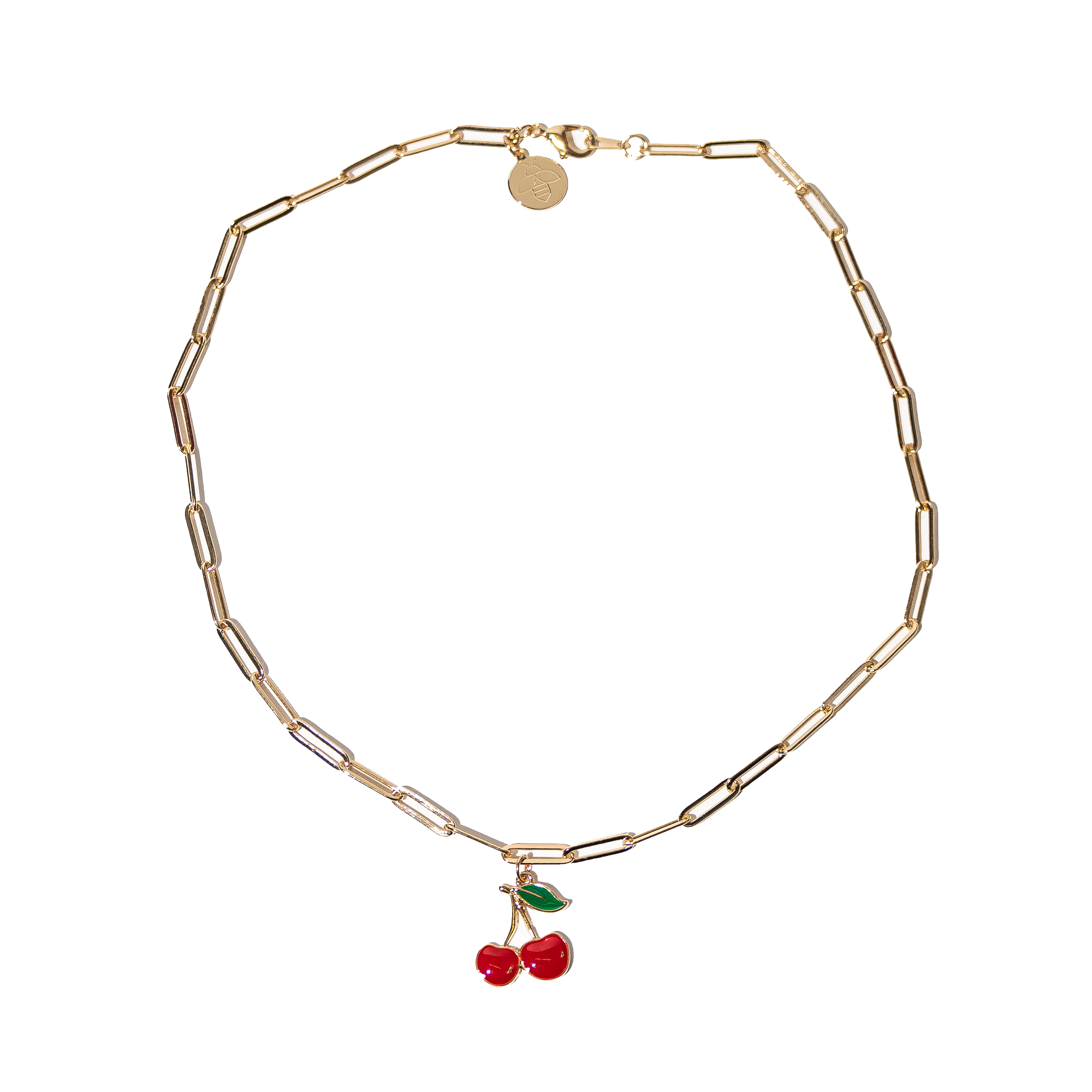 Close-up of the Acerola Cherry Necklace, a stylish gold chain necklace with a cute red cherry pendant.