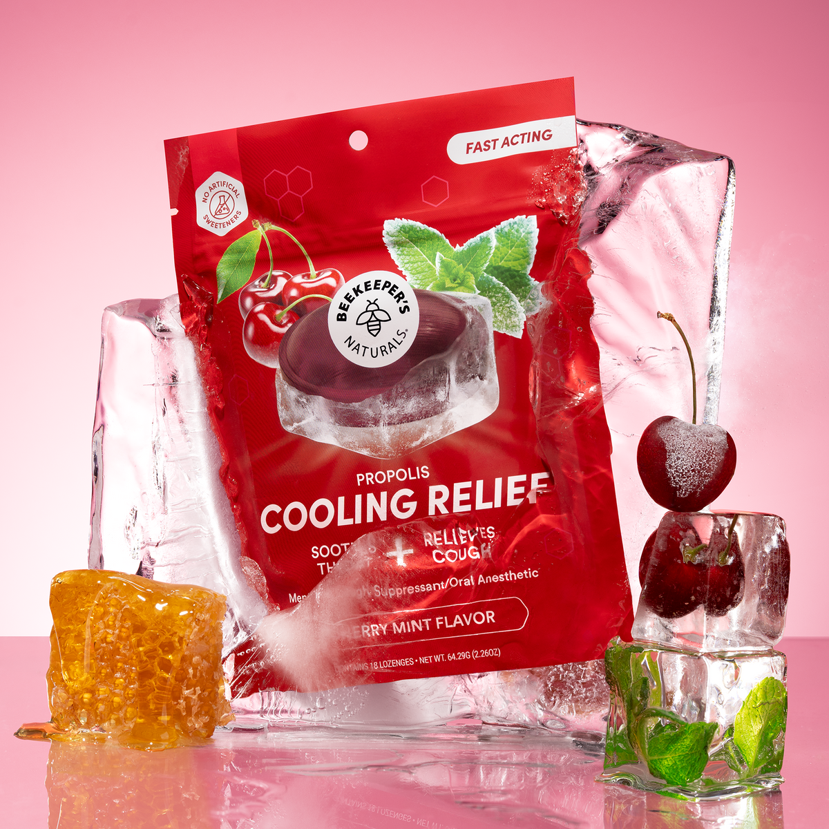 Front view of Cherry Mint Cooling Relief Lozenges package with Cooling Relief text, ice, cherries, mint, and honey
