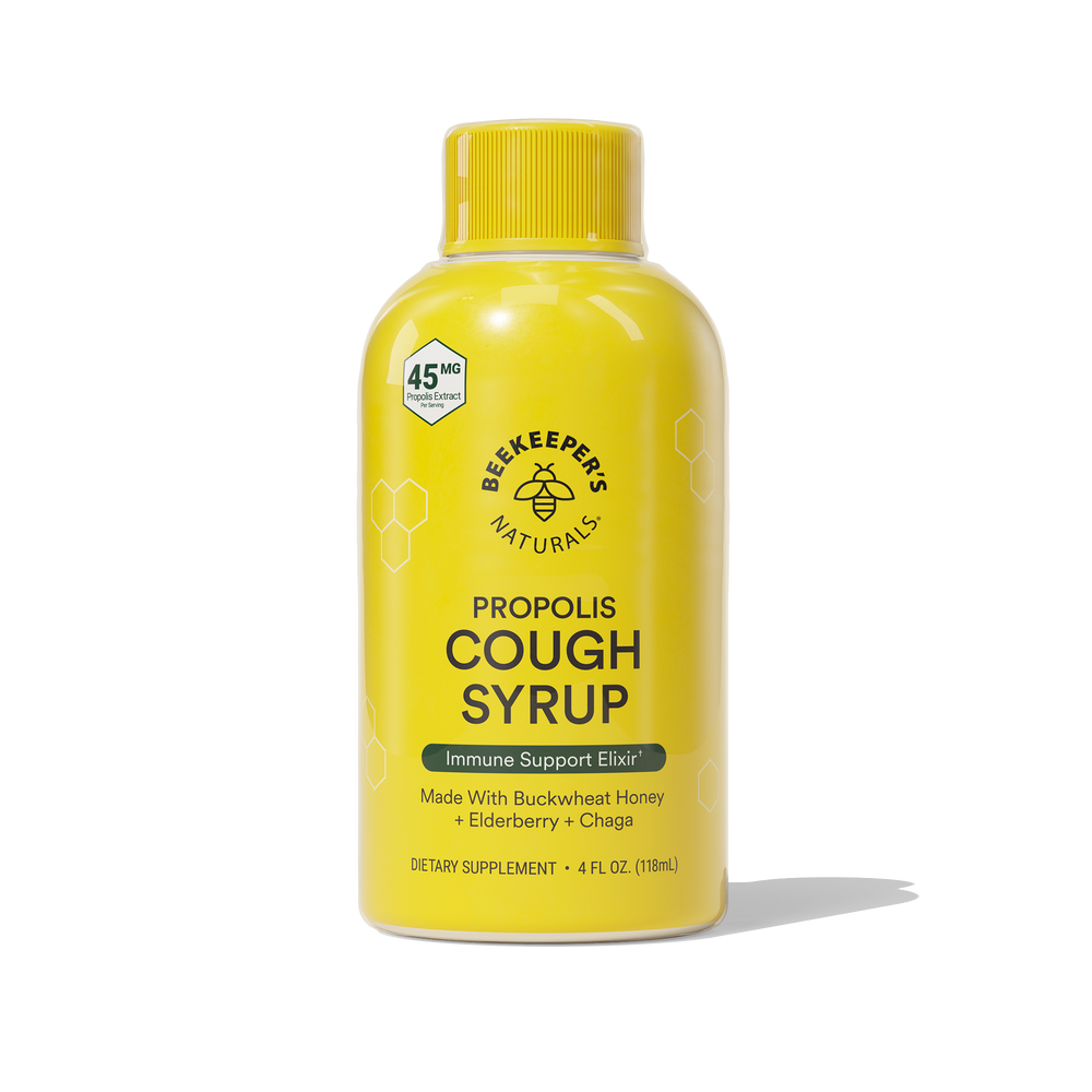 A bottle of Daytime Propolis Cough Syrup with a yellow label, made with buckwheat honey, elderberry, and propolis.