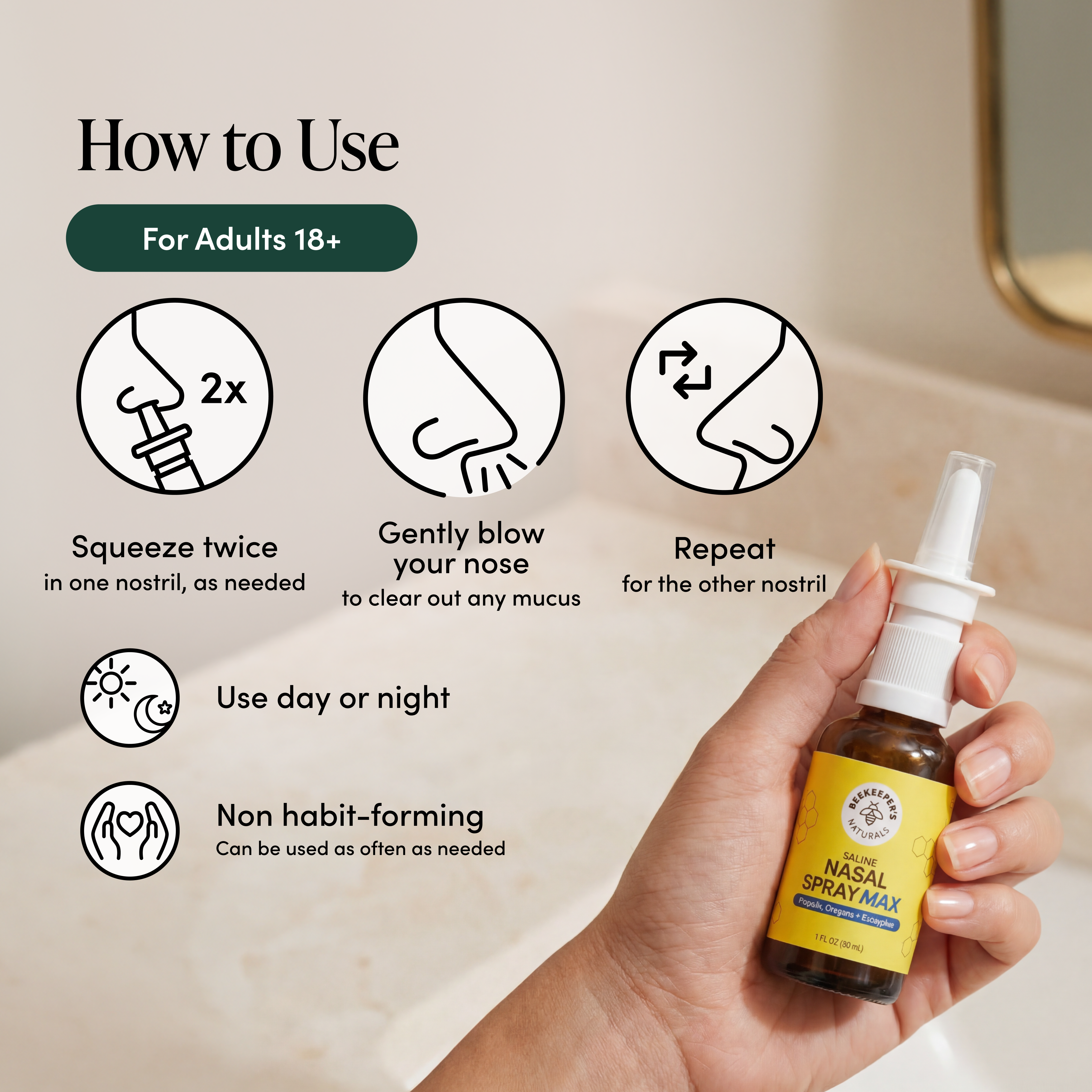 Hand holding a nasal spray bottle with usage instructions on a neutral background