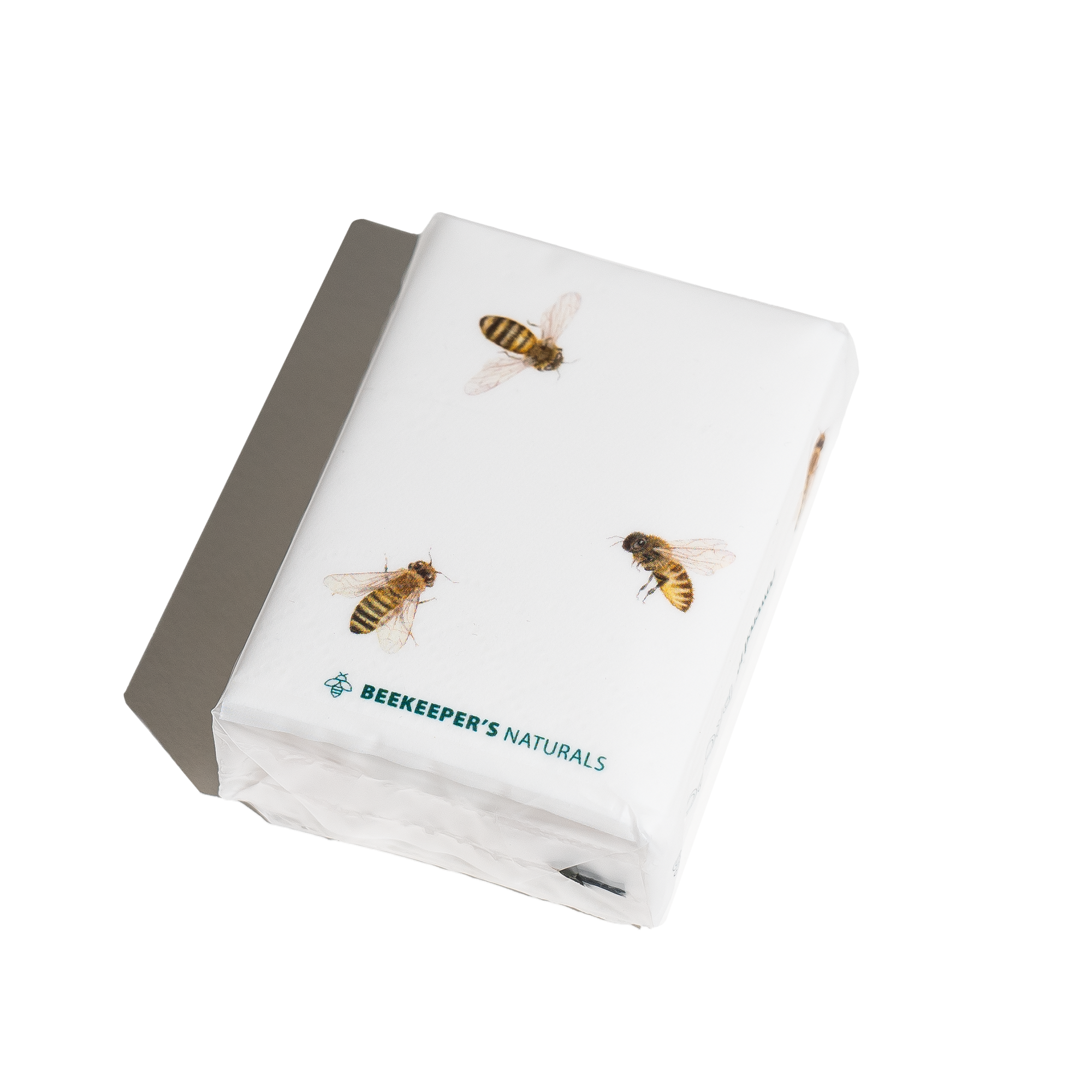 Beekeeper's Naturals tissues with bees, showcasing the sustainable, natural essence of the brand.