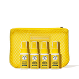 Set of yellow immune support products with a mesh pouch on a white background