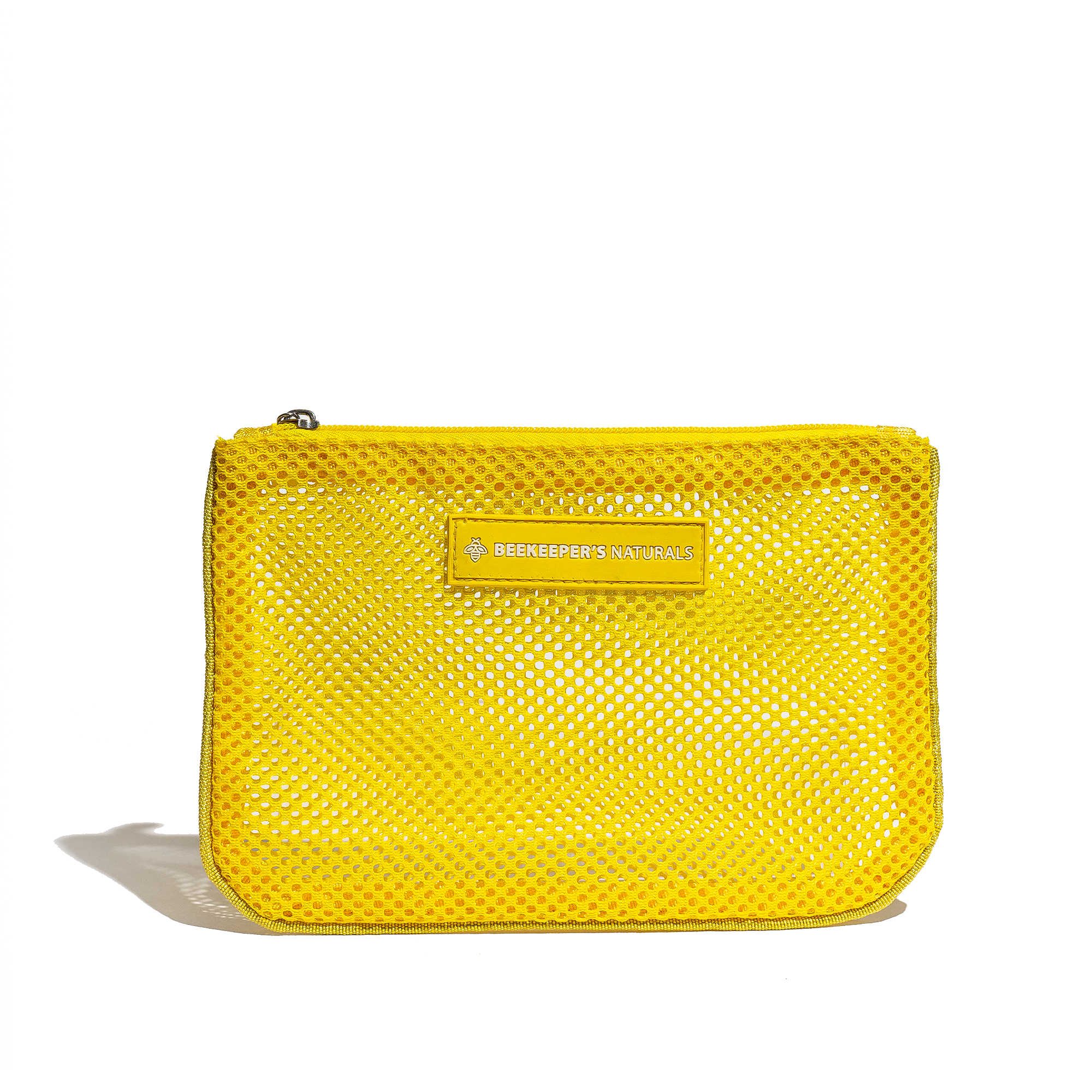 Yellow mesh pouch from Beekeepers Naturals. Great for travel, organizing small items, or carrying essentials.
