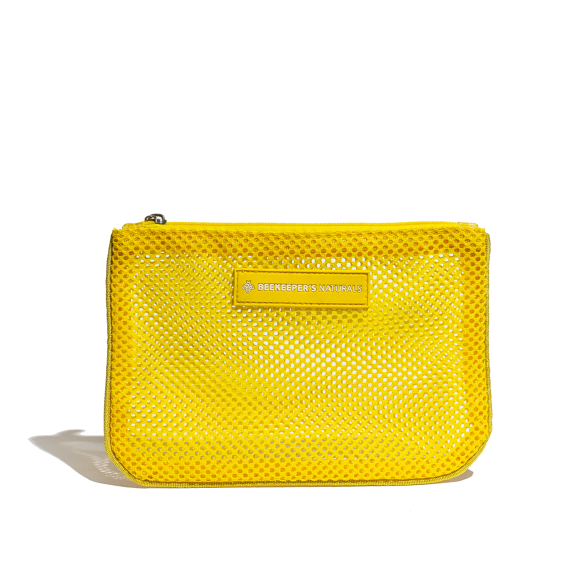 Yellow mesh pouch bag. "Beekeeper's Naturals" logo featured, ideal for travel, cosmetics or small items.