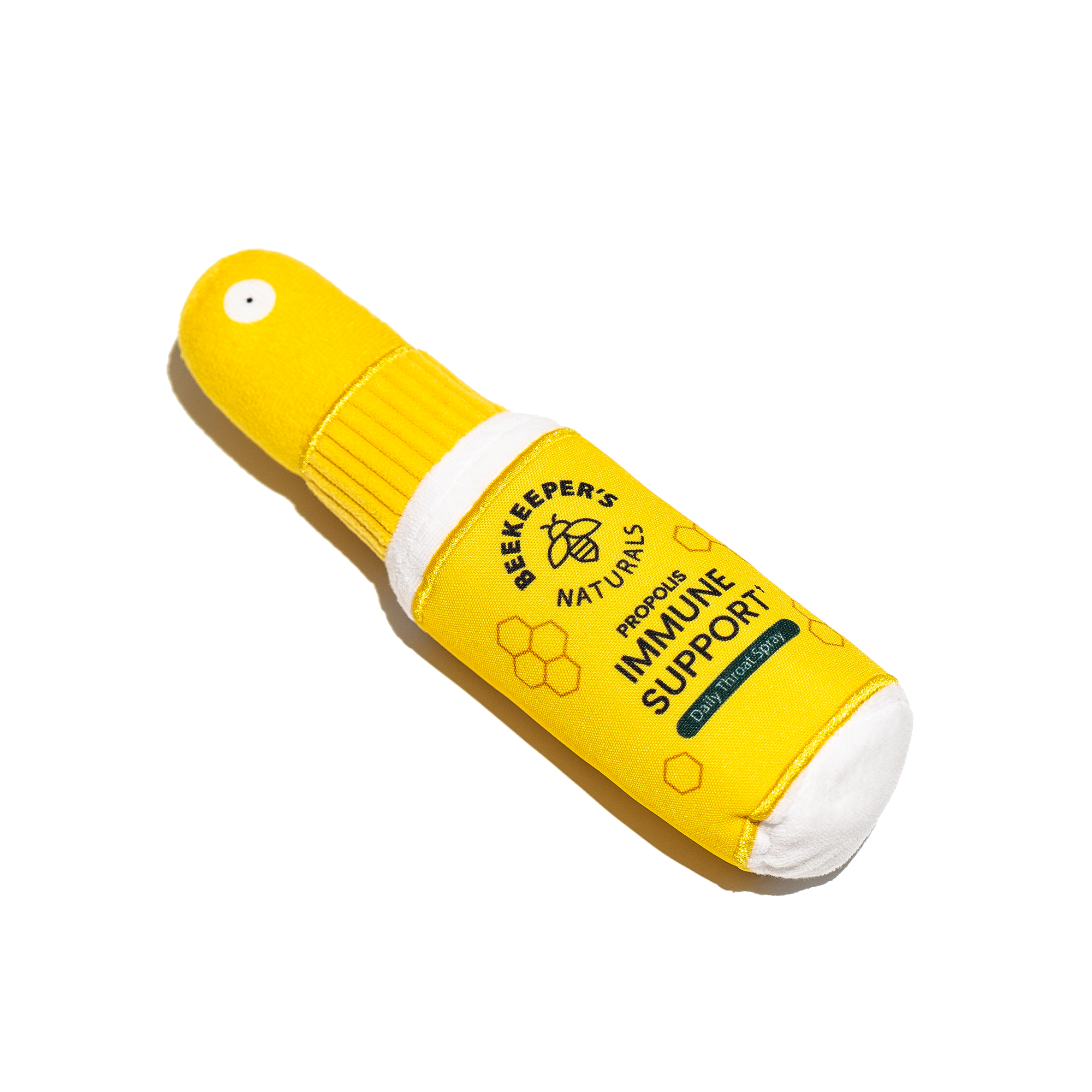 Front view of yellow plush toy shaped like the propolis immune support spray bottle with Beekeeper's Naturals label on white