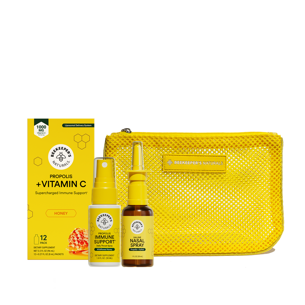 Health supplement set with bottles, packaging, and a pouch on a white background