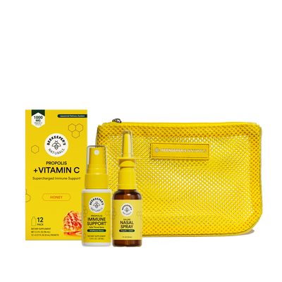 Health supplement set with bottles, packaging, and a pouch on a white background