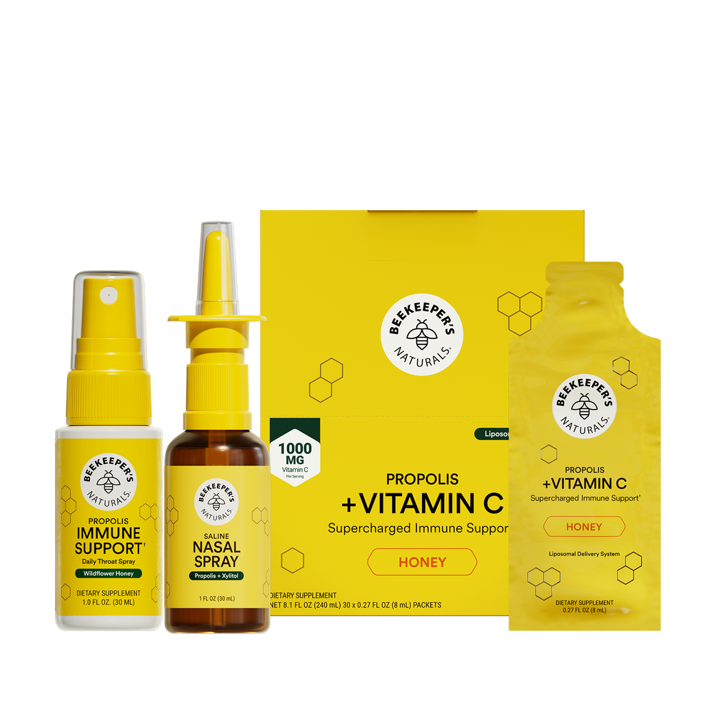 Front view of Daily Immune Bundle with throat spray, nasal spray, and propolis vitamin C packets in yellow packaging