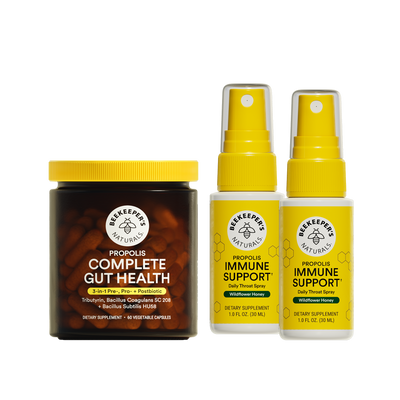 Collection of Beekeeper's Naturals health products including complete gut health jar and two immune spray bottles on a white background.