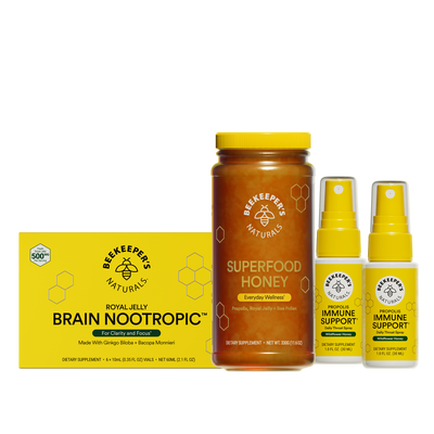 Collection of Beekeeper's Naturals products including honey, brain nootropic, and immune support sprays on a white background.