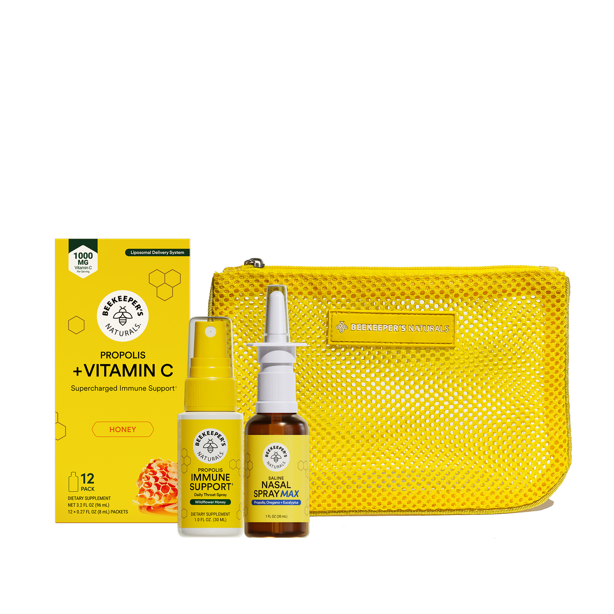 Beekeeper's Natural wellness gift set featuring a yellow mesh pouch, a box of Propolis + Vitamin C, an Immune Support spray, and a Nasal Spray Mask, all on a white background.