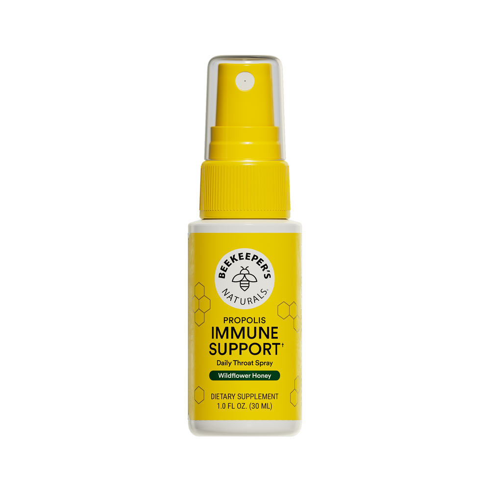 Yellow spray bottle labeled 'Beekeeper's Naturals Immune Support' on a white background