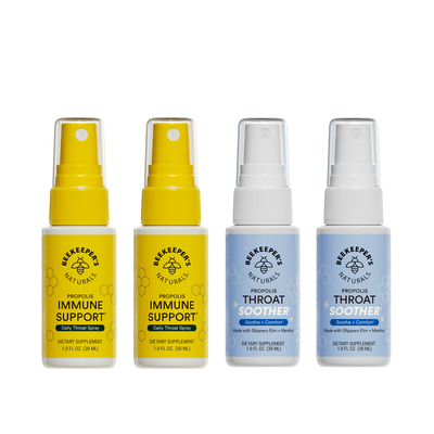Four bottles of Beekeeper's Naturals immune support and throat soother sprays on a white background.