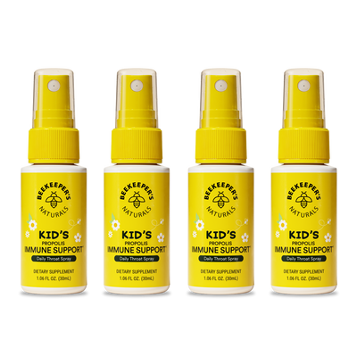 Four bottles of Beekeeper's Naturals Kid's Propolis Immune Support spray on a white background