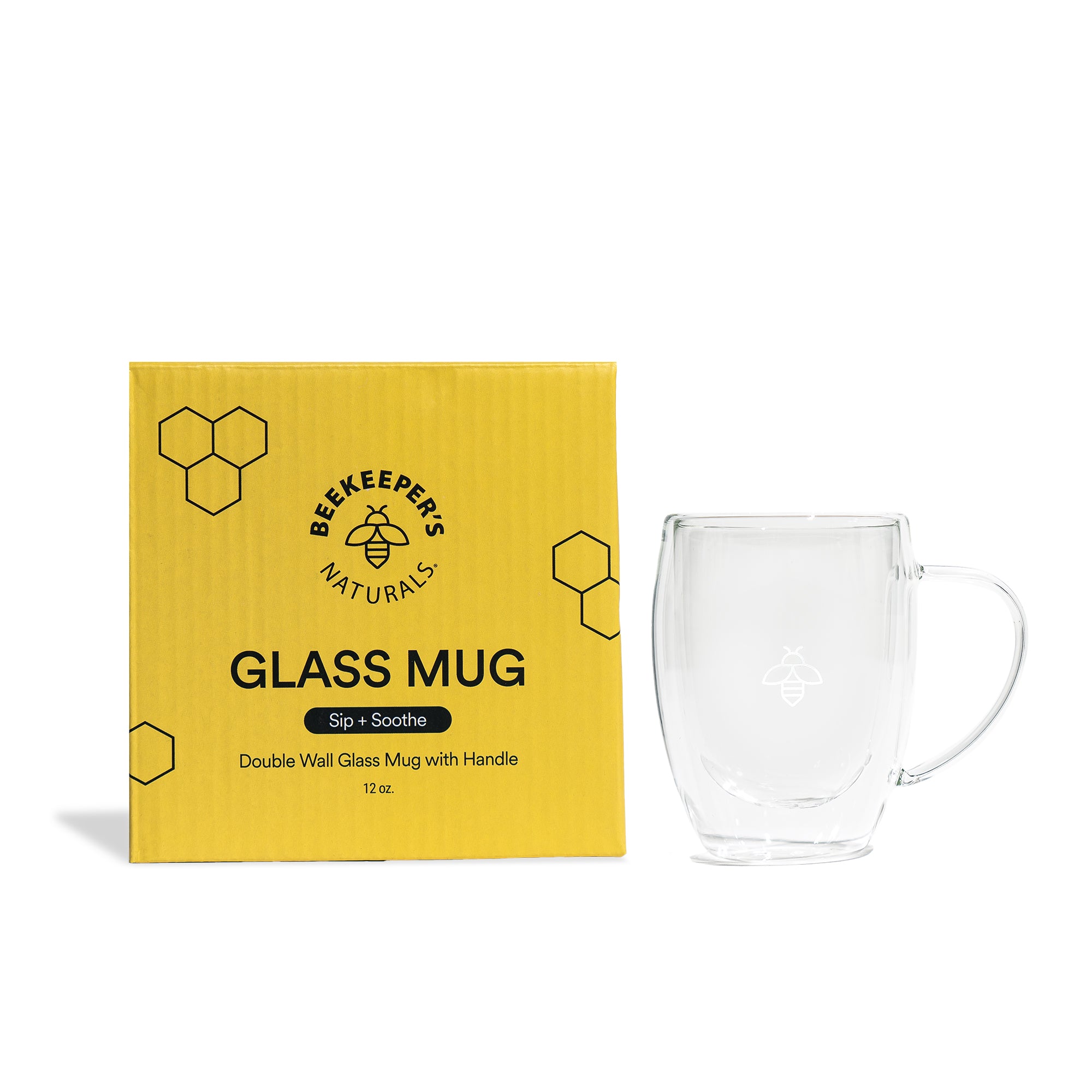 BKN Mug: Double-walled glass mug with handle, next to its box with the Beekeeper's Naturals logo and the text "Glass Mug Sip