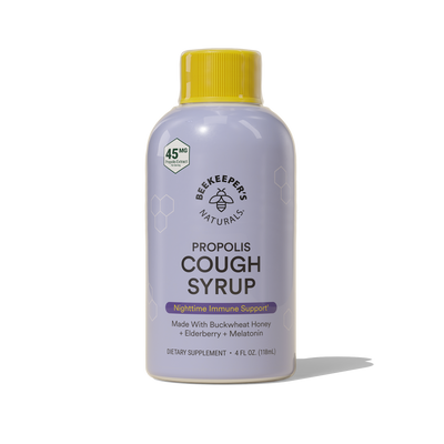 Front view of Nighttime Propolis Cough Syrup bottle with yellow cap showing product label on white background