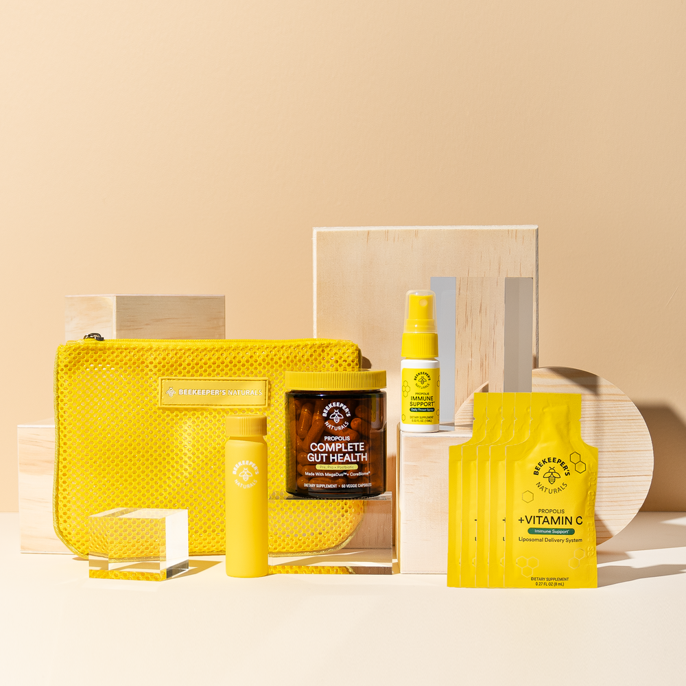 Beekeeper's Naturals Gut Health Starter Kit including propolis throat spray, gut health capsules, and vitamin C supplement