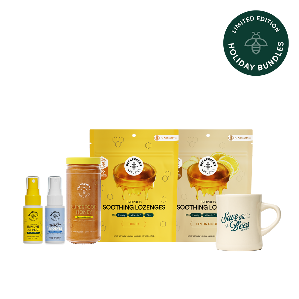 Collection of honey products including lozenges, spray, jar, and mug with 'Save the Bees' message on a white background.