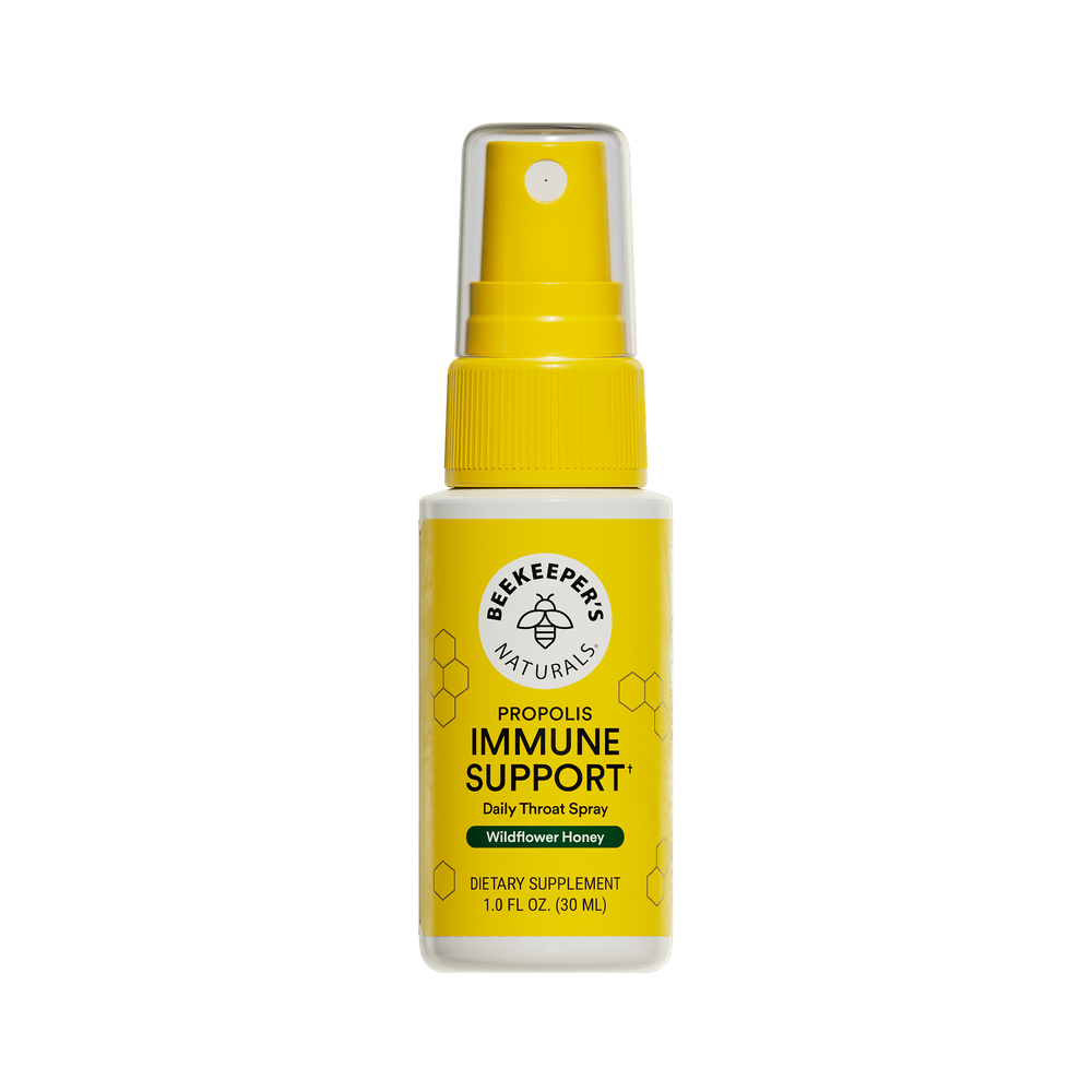 Yellow spray bottle labeled 'Beekeeper's Naturals Immune Support' on a white background