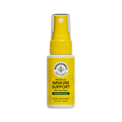 Yellow spray bottle labeled 'Beekeeper's Naturals Immune Support' on a white background