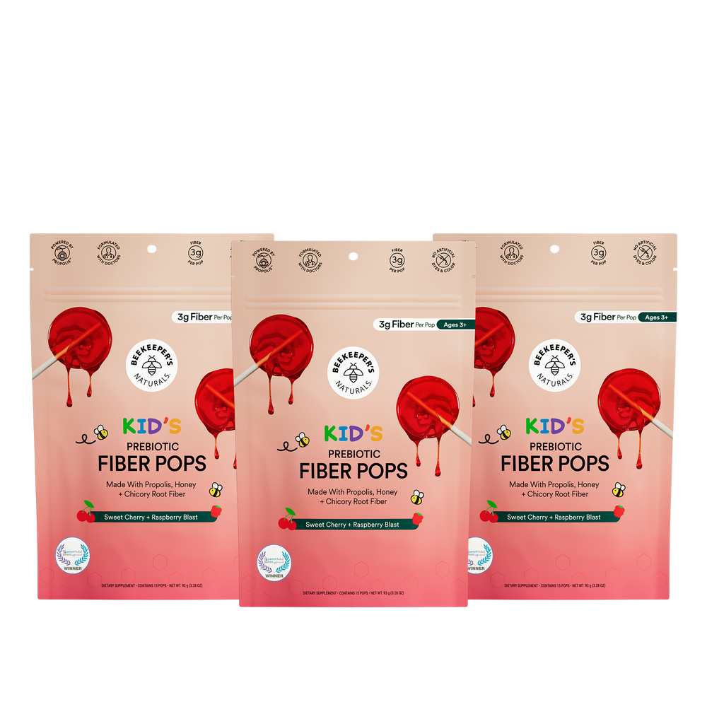 Three packages of Kids' Prebiotic Fiber Pops on a white background