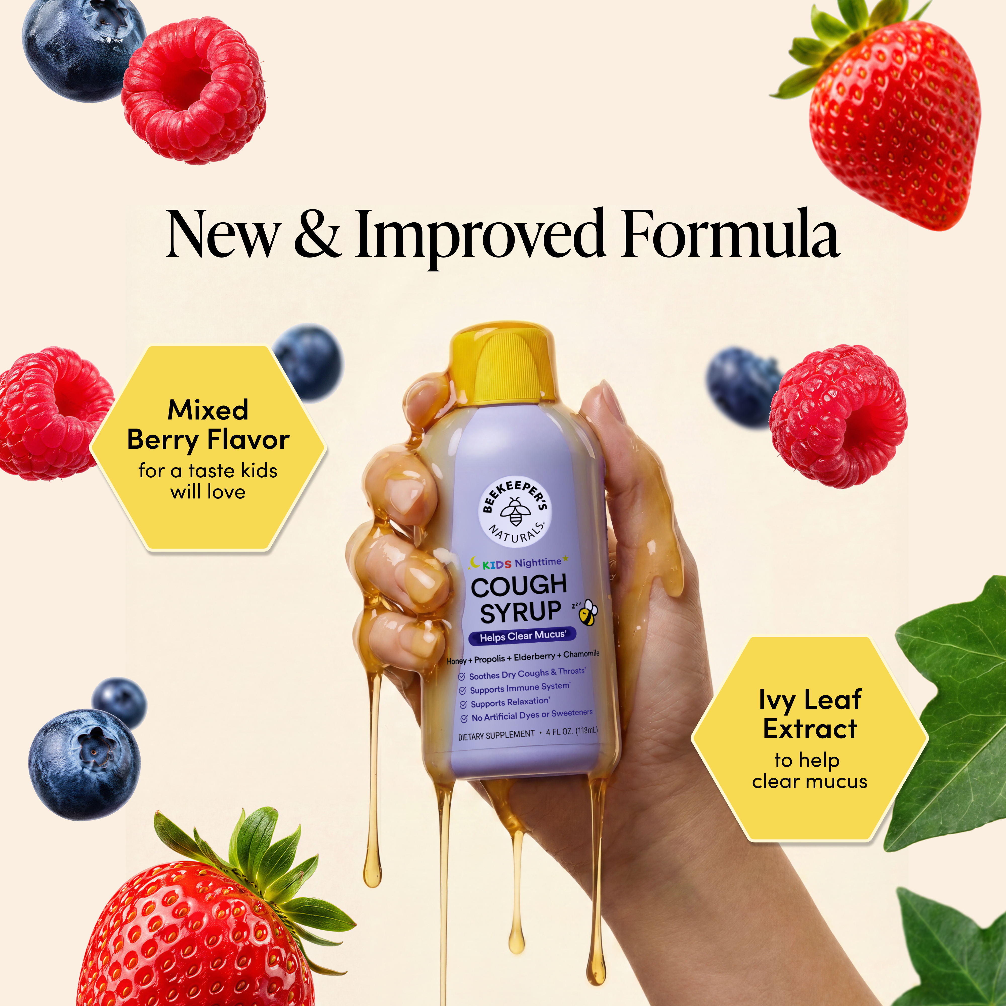 Hand holding a bottle of cough syrup with mixed berry flavor and ivy leaf extract, surrounded by berries and leaves on a beige background.