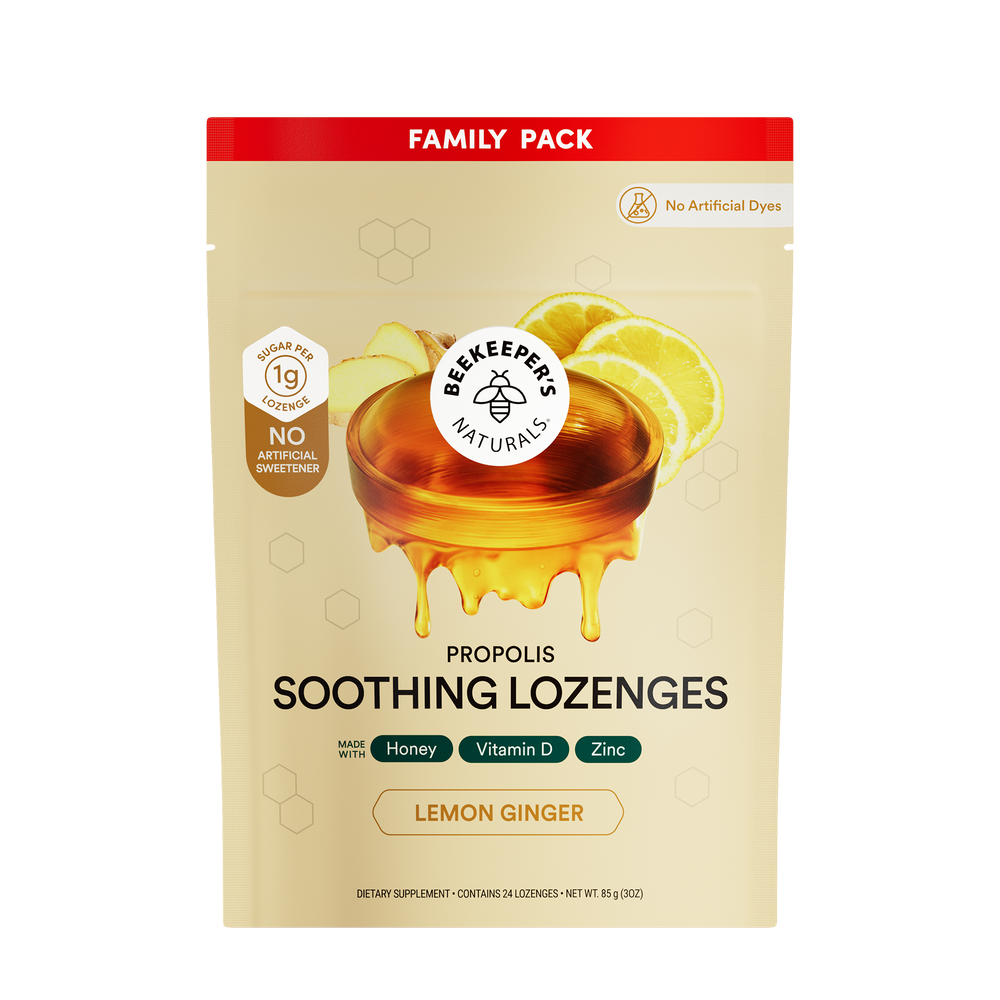 Beekeeper's Naturals Propolis Soothing Lozenges family pack with honey and lemon design on a beige background.
