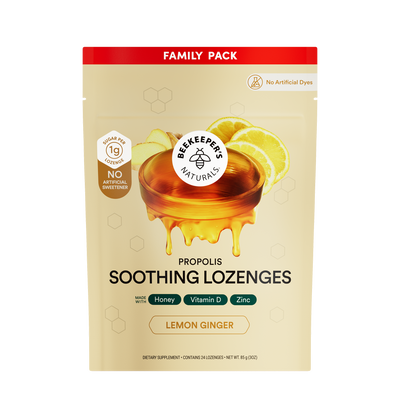 Beekeeper's Naturals Propolis Soothing Lozenges family pack with honey and lemon design on a beige background.