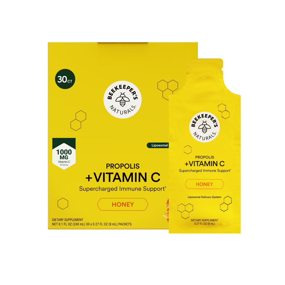 A yellow box and matching single-use pouch of Beekeeper Naturals Propolis + Vitamin C supplement, labeled Honey, on a plain white background.