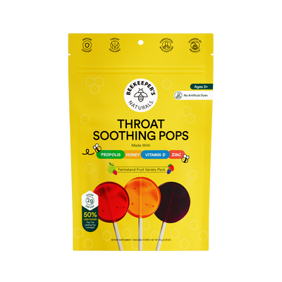 Yellow package of Beekeeper's Naturals Throat Soothing Pops on a white background