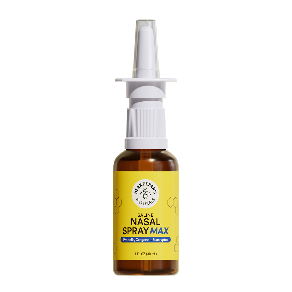 Nasal spray bottle with yellow label on a white background