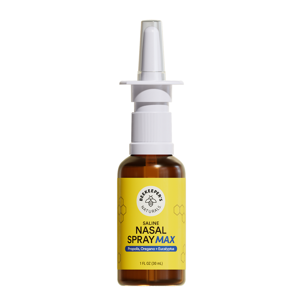 Nasal spray bottle with yellow label on a white background