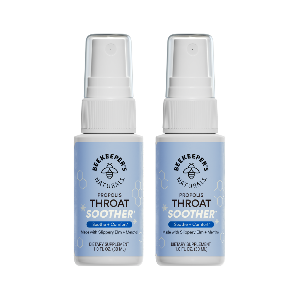 Two bottles of Beekeeper's Naturals Propolis Throat Soother on a white background