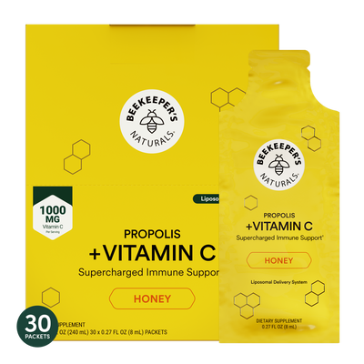 Beekeeper's Naturals Propolis + Vitamin C supplement packets on a white background