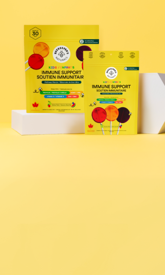 Two yellow stand-up pouches of Weary Wolf Immune Support lollipops displayed on white blocks against a solid yellow background.