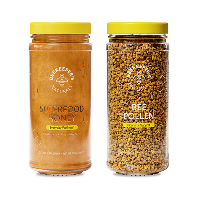 Front view of Superfood Duo showing Superfood Honey jar and Bee Pollen jar on white background